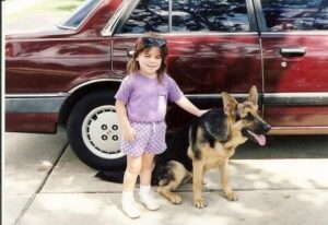Young Chelsea and her dog